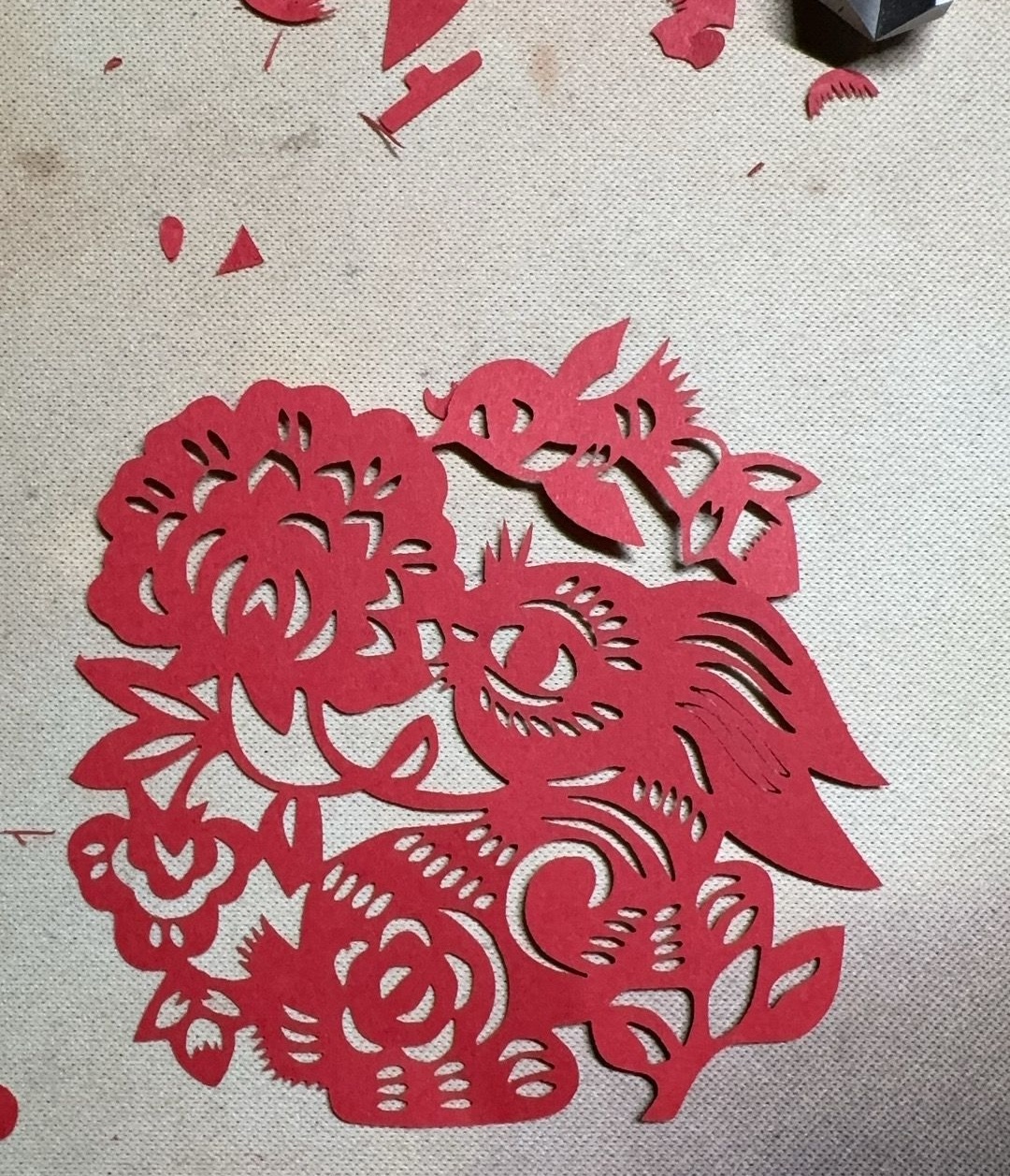 Traditional paper cutting finished art showing layers and negative space